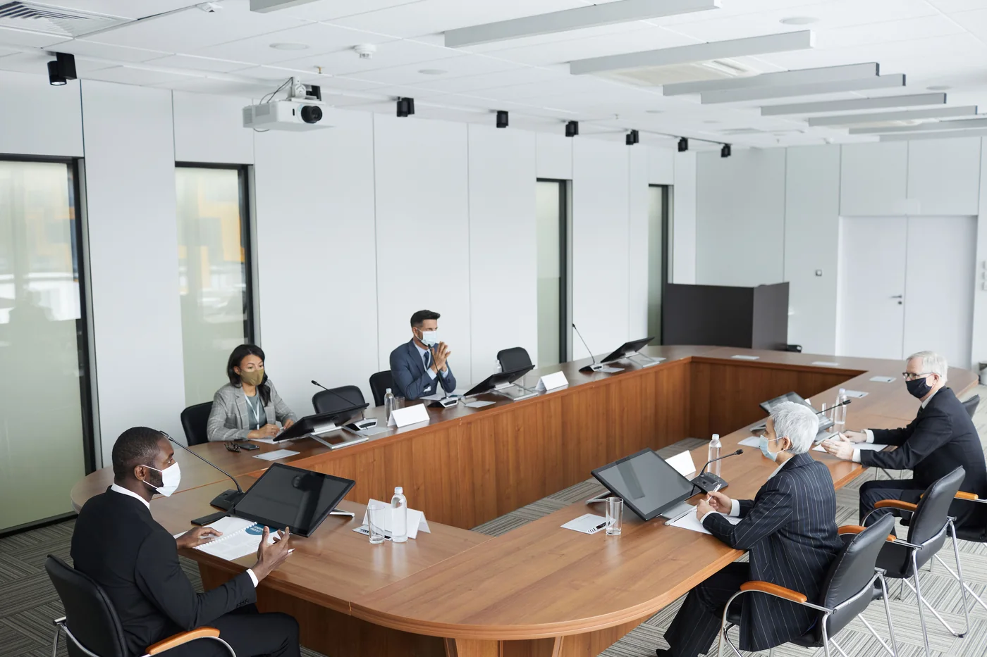 Participants gathered around a conference table