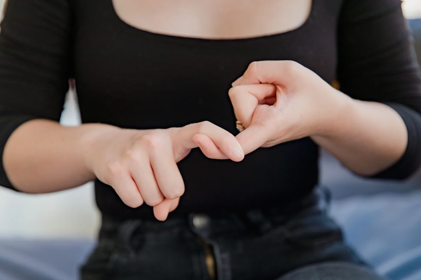 Close view of hands communicating in sign language