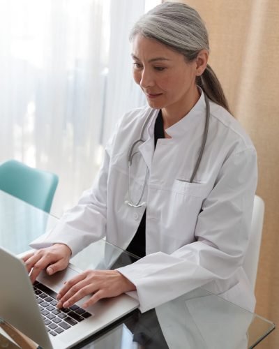 medical-specialist-working-on-laptop-at-office-2022-02-16-20-06-41-utc (1) (1)